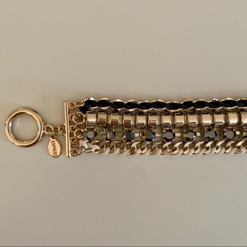 gold & black statement bracelet with fringe